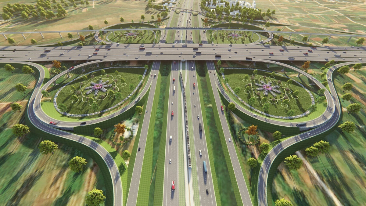 Trong ảnh là cầu vượt đại lộ Thăng Long, được thiết kế liên thông khác mức dạng hoa thị. Đây là một trong số 8 cây cầu vượt nút giao khác mức liên trong nằm dọc tuyến đường Vành đai 4. (Ảnh: UBND TP Hà Nội)