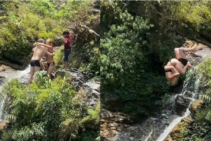Hình ảnh đôi nam nữ người nước ngoài đứng trên thác Du Già nhảy xuống khiến nhiều người thót tim hồi tháng 5 (Ảnh chụp màn hình)