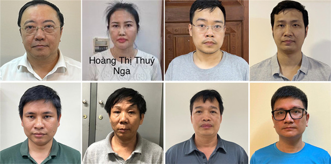 Từ trái sang: các bị can Phan Huy Anh Vũ, Hoàng Thị Thúy Nga, Nguyễn Quang Minh, Nguyễn Tiến Thu, Hoàng Thế Quỳnh, Nguyễn Công Tiến, Ninh Văn Sinh, Vũ Quang Ngọc (Ảnh nguồn CAND)