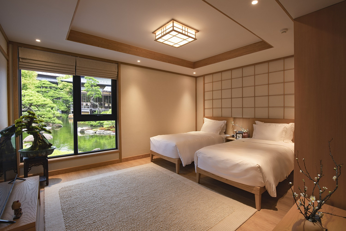 Không gian phòng ngủ biệt thự Sun Onsen Village đưa trải nghiệm nghỉ dưỡng lên một tầm cao mới. Ảnh Sun Group