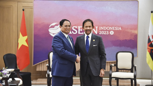 Thủ tướng Phạm Minh Chính và Quốc vương Brunei Darussalam Sultan Haji Hassanal Bolkiah - Ảnh: VGP/Nhật Bắc