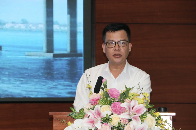 Ông Nguyễn Việt Hưng báo cáo tại buổi lễ