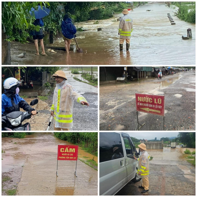 Công an huyện Tân Lạc bố trí lực lượng chức năng đảm bảo giao thông tại các điểm ngập úng, đồng thời cắm biển cảnh bảo để người dân tham gia giao thông được an toàn