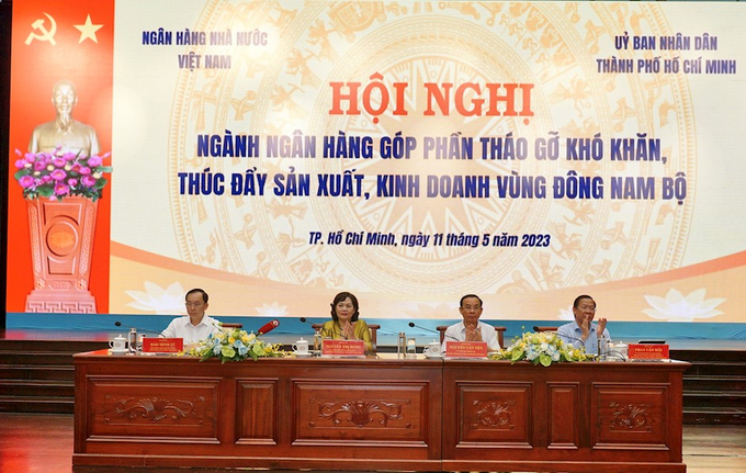 Về việc điều hành chính sách tiền tệ, NHNN cần phải cân đối làm sao vừa phải tăng trưởng tín dụng, ổn định tỷ giá, giảm lãi suất… (Ảnh: Thành ủy TP.HCM)