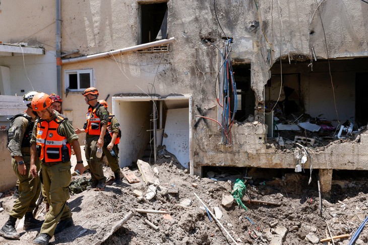 Một tòa nhà bị hư hại ở Beit She'an, Israel, ngày 21-6 - Ảnh: AFP