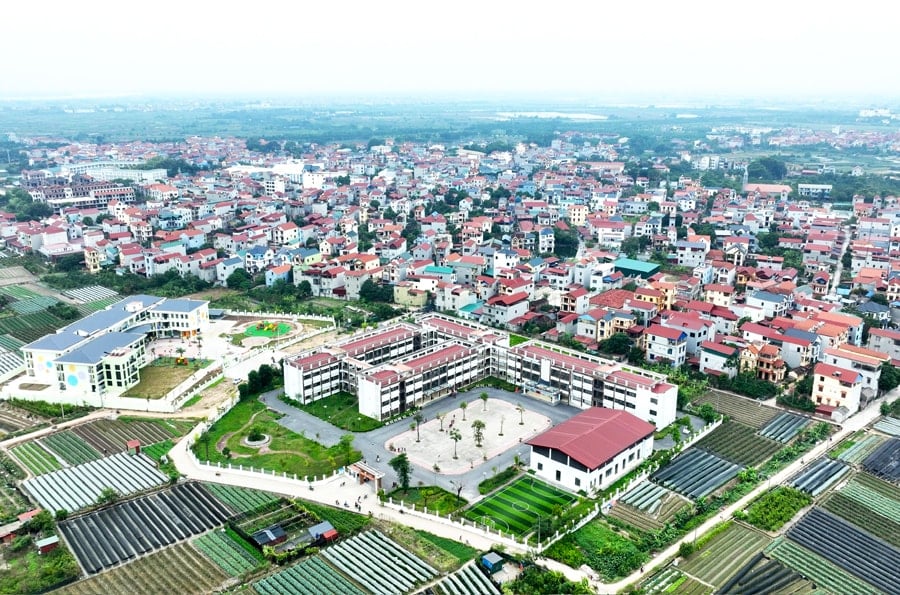 Diện mạo nông thôn mới khang trang tại xã Quang Minh. Ảnh: Quang Thái