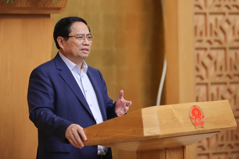 Thủ tướng Chính phủ Phạm Minh Chính chủ trì cuộc họp của Ban Thường vụ Đảng uỷ Chính phủ và Chính phủ đánh giá tình hình sau 2 tháng vận hành chính quyền địa phương 2 cấp - Ảnh: VGP/Nhật Bắc