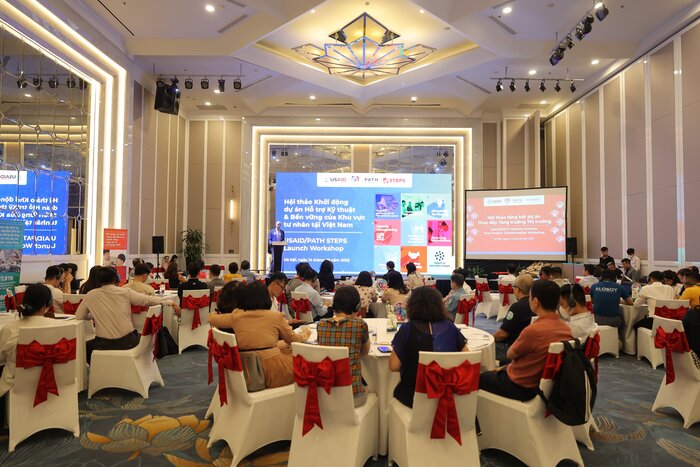 Quang cảnh buổi hội thảo tổng kết dự án 8 năm với tên gọi “Thúc đẩy tăng trưởng thị trường” và khởi động dự án “Hỗ trợ kỹ thuật và bền vững khu vực tư nhân tại Việt Nam'.