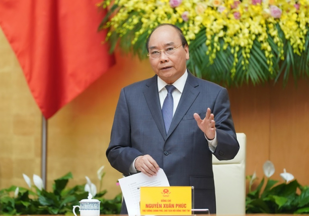   Thủ tướng Nguyễn Xuân Phúc đề nghị người dân Hà Nội, TP.HCM phải đeo khẩu trang ra đường.  