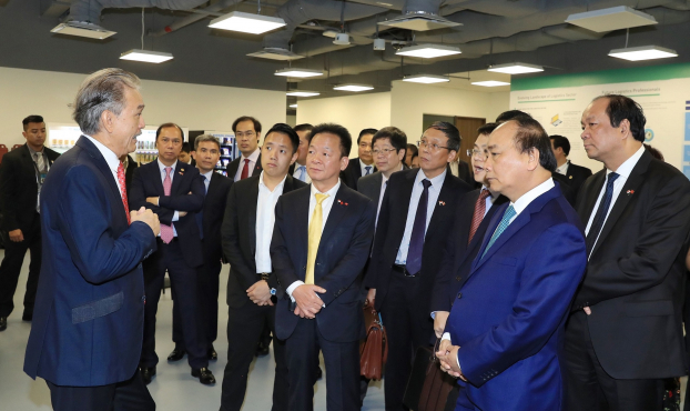   Ông Đỗ Quang Hiển, Chủ tịch HĐQT kiêm Tổng Giám đốc Tập đoàn T&T Group tháp tùng Thủ tướng Chính phủ Nguyễn Xuân Phúc đến thăm Công ty Thành phố chuỗi cung ứng (Supply Chain City) của Tập đoàn YCH vào tháng 4/2018.  