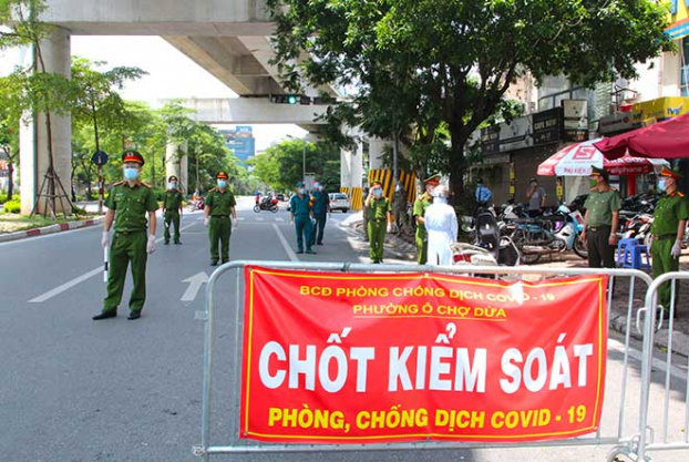   Một người tham gia trực chốt có biểu hiện sốt, ngạt mũi, xét nghiệm phát hiện mắc COVID-19. Ảnh minh họa  