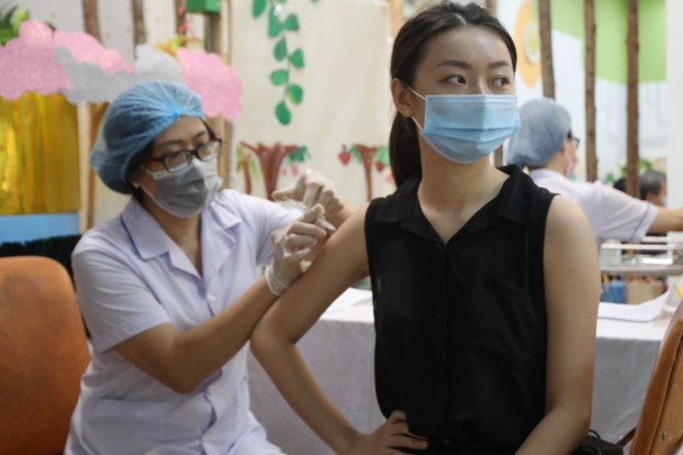   Hà Nội tiêm hơn 245.000 mũi vắc xin phòng COVID-19 trong ngày 13/9. Ảnh minh họa  