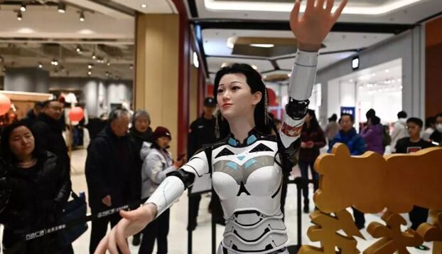 Robot vũ công nhảy múa tại một hội chợ ở Bắc Kinh,Trung Quốc. (Ảnh: AFP)