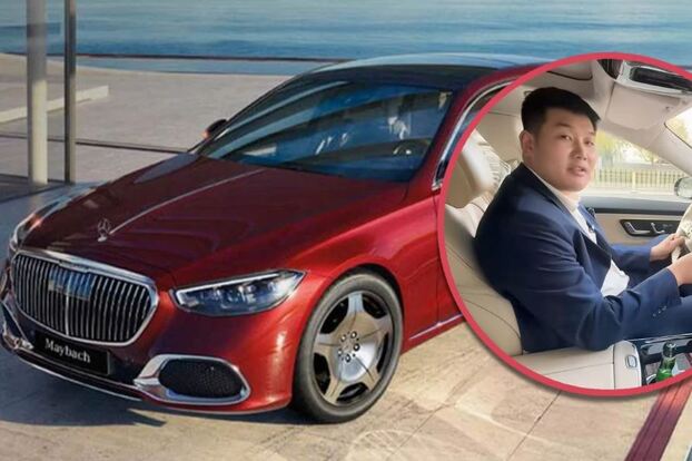 Tài xế Viên và chiếc Maybach của mình. (Ảnh: SCMP)