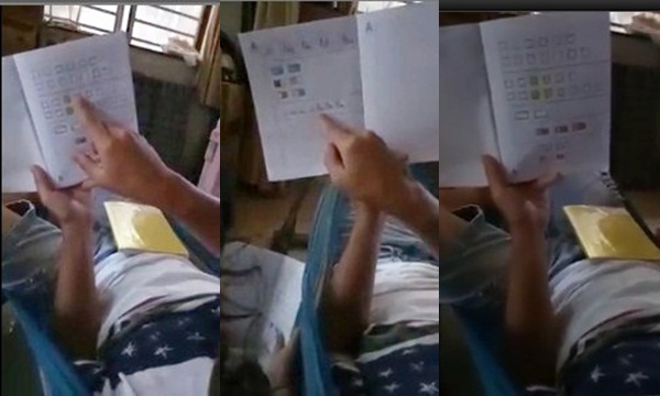   Hình ảnh từ clip trẻ đọc thơ vanh vách bằng chữ ô vuông, tam giác. (Ảnh chụp màn hình)  