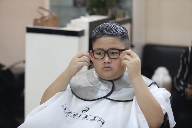 Cắt tóc giống Kim Jong-un, cậu bé Hà Nội bỗng dưng nổi tiếng bất ngờ 3