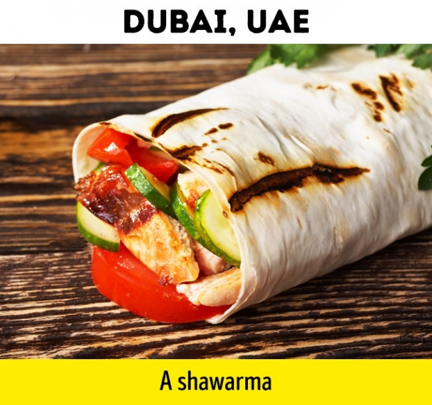   Tại Dubai, UAE, bạn sẽ mua được một cái shawarma với 1 USD. ó được làm bằng thịt gà hoặc cừu nướng thái mỏng, cuốn trong vỏ bánh mì dẹt, ăn kèm dưa chuột, hành tây, cà chua, bắp cải và nước sốt  