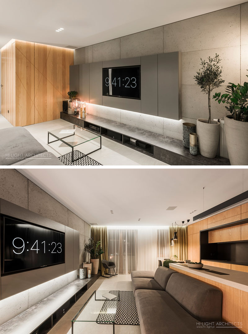 Căn phòng khách hiện đại với tivi siêu phẳng gắn tường