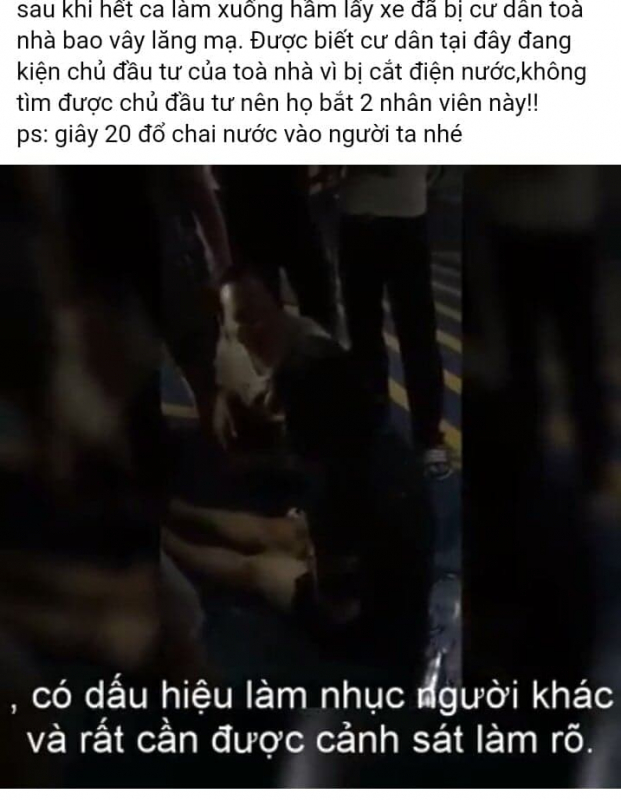   Hình ảnh nữ nhân viên Nguyễn Lê Dung bị bao vây, đổ nước đêm 21/10. Ảnh cắt từ Clip.  
