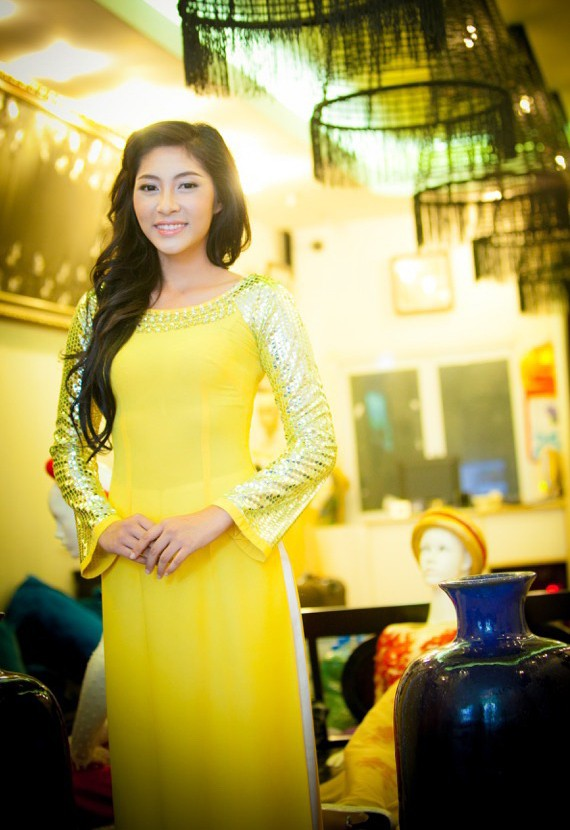 dang-thu-thao-len-duong-tham-du-hoa-hau-quoc-te-2014-giadinhonline.vn 2