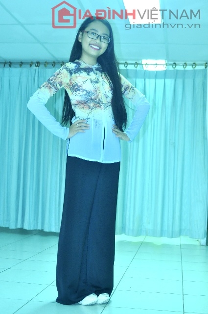 huyen-tran-phuong-my-chi-duyen-dang-trong-ta-ao-dai-ba-ba-giadinhonline.vn 5