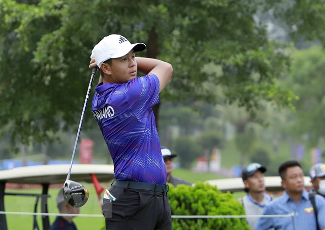 Ratchanon trong màu áo tuyển golf Thái Lan dự SEA Games 31 (ảnh: TTXVN)