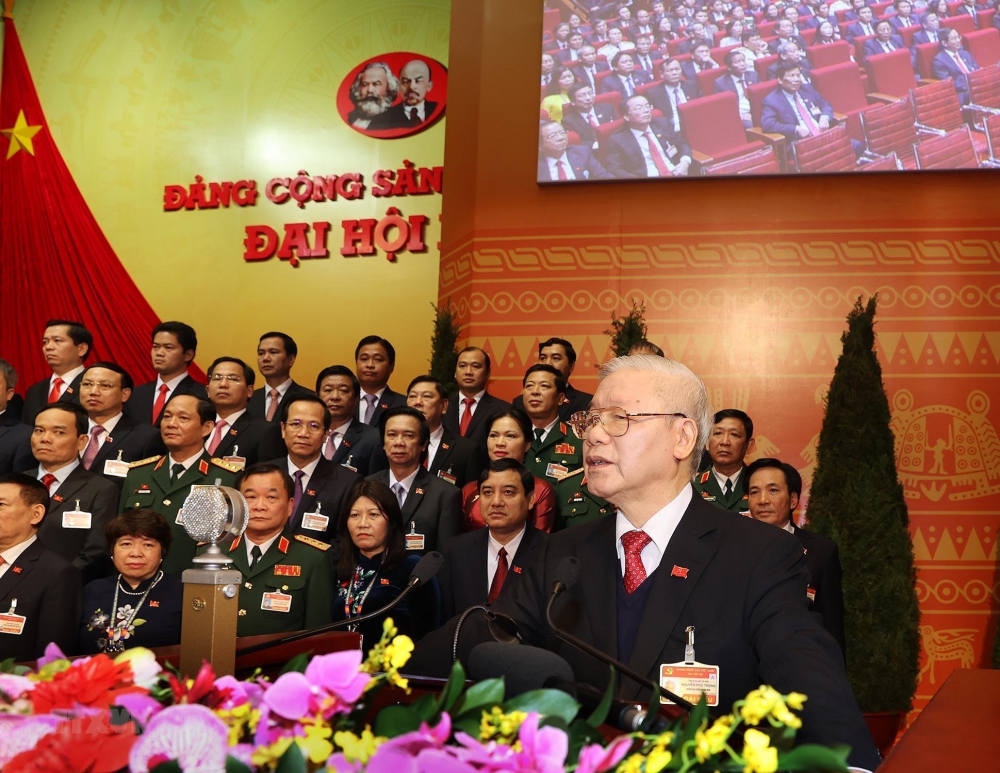 Ban chấp hành Trung ương Đảng khóa XIII ra mắt Đại hội, Tổng Bí thư Nguyễn Phú Trọng phát biểu.   