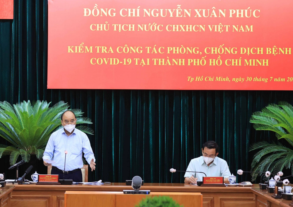 Chủ tịch nước Nguyễn Xuân Phúc làm việc với lãnh đạo chủ chốt TPHCM - Ảnh: VGP