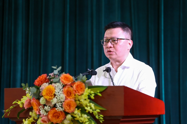 Chủ tịch Hội Nhà báo Việt Nam Lê Quốc Minh báo cáo kết quả và nhiệm vụ trọng tâm của Hội Nhà báo (Ảnh: VGP)