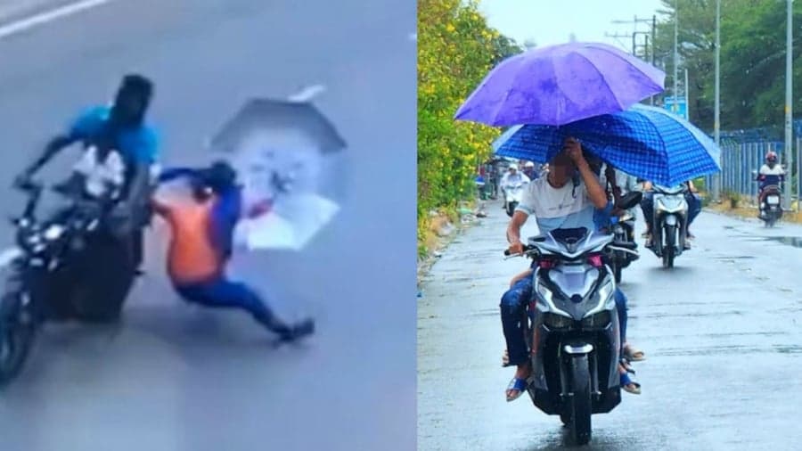 Cầm ô (dù) khi đi xe máy  2