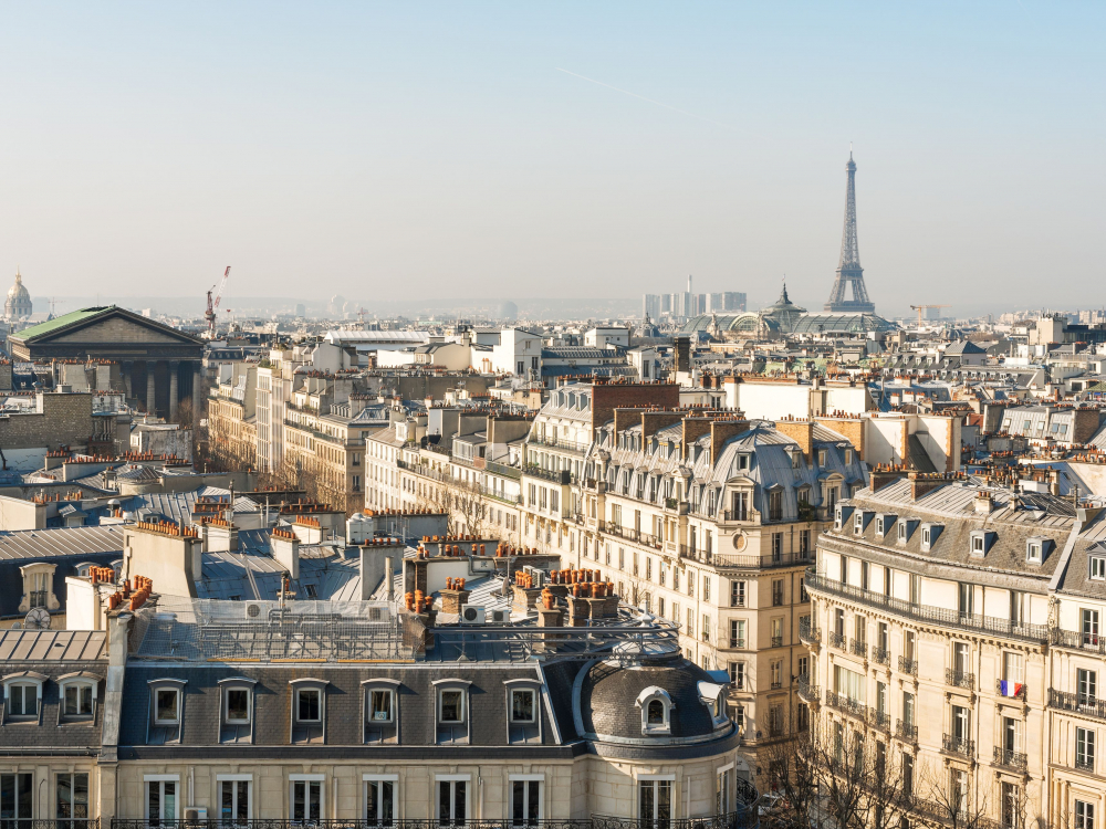 paris-skyline-with-eiffel-tower-aerial-view-in-daylight-637176190-5b173440119fa80036adf984