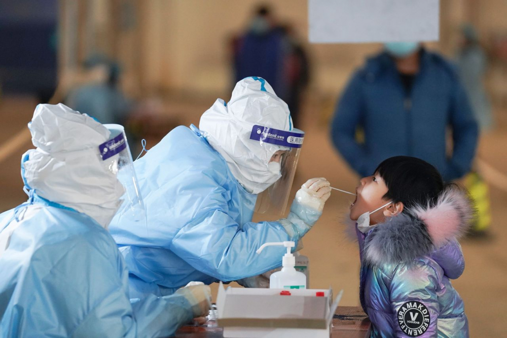 A_coronavirus_testing_site_on_Jan_2021_in_Beijing_where_health_officials_said_they_had_discovered_the_more_contagious_U.K._variant_of_the_virus._Xinhua_