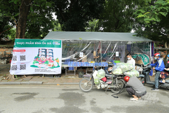 Mr. Tran Ngoc Tuan, in charge of the food booth said, 'The booth opens from 6 am and closes at 6 pm daily. The veggies are imported directly from a trustworthy provider in Dan Phuong district to ensure food safety.'
