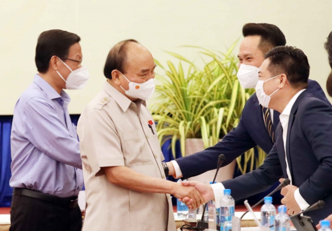 Chủ tịch nước Nguyễn Xuân Phúc gặp gỡ các doanh nhân tại TP.HCM. Ảnh: VGP.