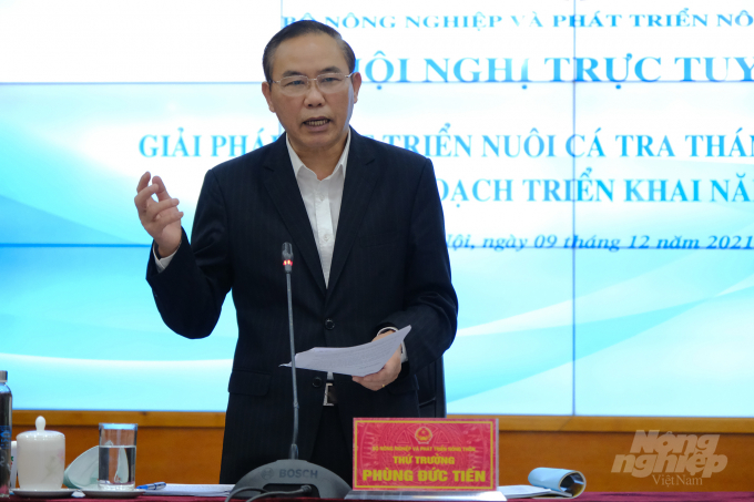  Deputy Minister of Agriculture and Rural Development Phung Duc Tien addresses the meeting on catfish industry development on December 9. Photo: Đức Minh.