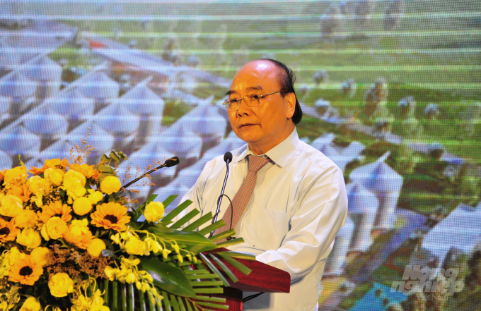 Chủ tịch nước Nguyễn Xuân Phúc phát biểu tại lễ khánh thành Nhà máy gạo Hạnh Phúc tại An Giang. Ảnh: Lê Hoàng Vũ.