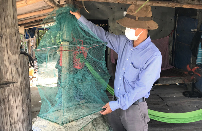 Lưới lồng dùng để thu hoạch tôm sú trong ao nuôi thủy sản tổng hợp của người dân Cồn Chim, xã Phước Sơn (huyện Tuy Phước, Bình Định). Ảnh: V.Đ.T.