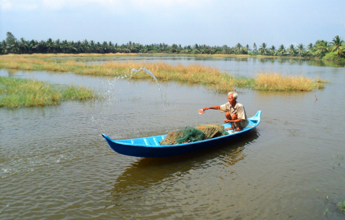 River Delta farmer. Photo: Le Hoang Vu. 