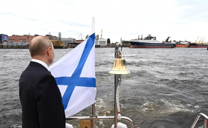In this photo provided by the Kremlin, Vladimir Putin attends the launch ceremony for Mekanik Sizov, a super trawler belonging to a company partly owned by sanctioned businessman Gleb Frank in St. Petersburg, Russia. A U.S. ban on seafood imports from Russia over its invasion of Ukraine was supposed to sap billions of dollars from Vladimir Putin’s war machine. But shortcomings in import regulations means that Russian-caught pollock, salmon and crab are likely to enter the U.S. anyway, by way of the country vital to seafood supply chains across the world: China. Photo: The Kremlin via AP
