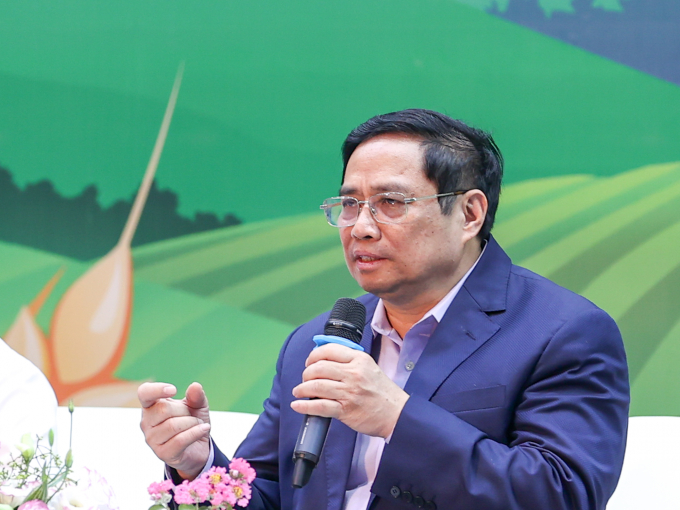 Thủ tướng Phạm Minh Chính trả lời câu hỏi của người dân tại Hội nghị. 