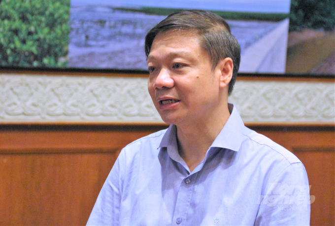 Mr. Tran Quang Bao emphasized the importance of the mangrove ecosystems in preventing coastal erosion and mitigating the adverse effects of the rising sea level. Photo: Pham Hieu.