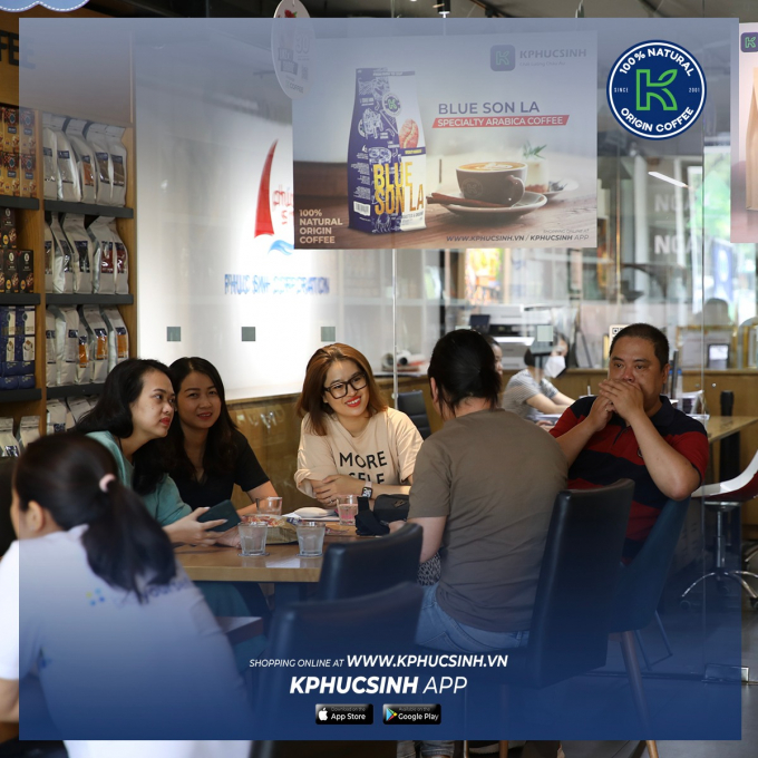 Customers enjoying coffee at K COFFEE store.