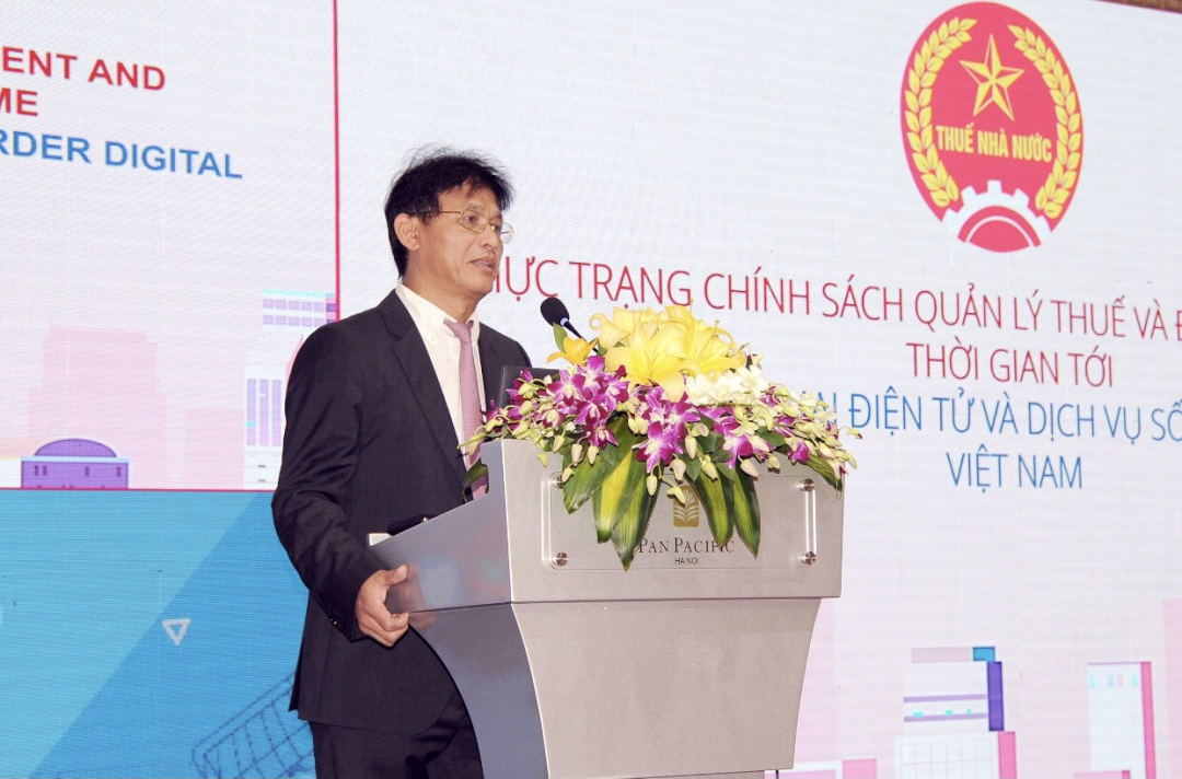Phó Tổng cục trưởng Tổng cục Thuế Đặng Ngọc Minh phát biểu tại hội thảo.