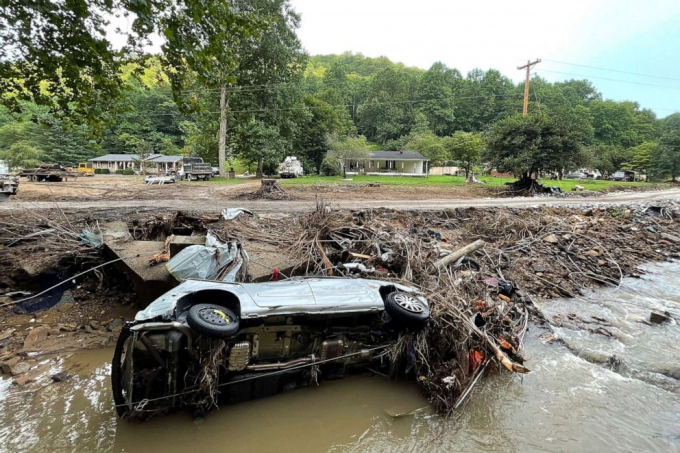 A car washed into the Squabble Creek by the floods in Buckhorn, Ky., Aug. 5, 2022.