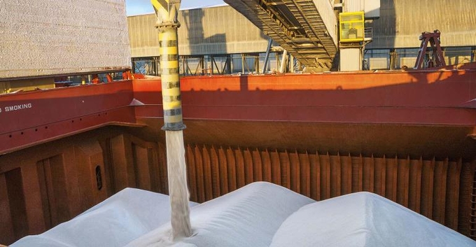 Fertilizer is loaded into a shiphold in Russia while prices across the world soar due to limited supply.