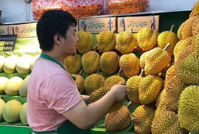 A fruit shop sells durians in Beijing.