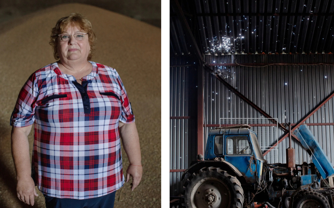 Nadezhda Petrovskaya poses for a portrait in front of grains stored in her warehouse.