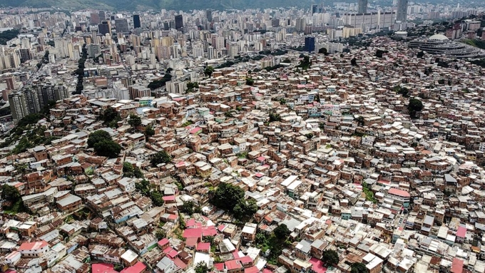 An aerial view shows overpopulated neighborhoods in the southwest of Caracas, Venezuela, Aug. 27., 2022.