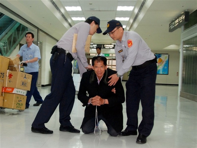 'Vua biểu tình' Ke Tsi-hai trong một cuộc biểu tình tại sân bay Taitung hồi năm 2011 để phản đối vấn nạn lao động cưỡng bức. Ảnh:  CNA