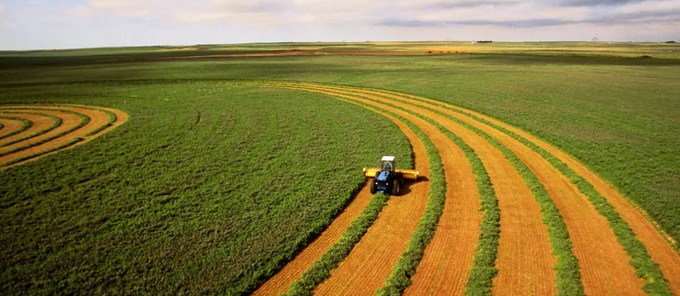 Harvesting alfalfa crop, aerial view. Photo: Getty Images